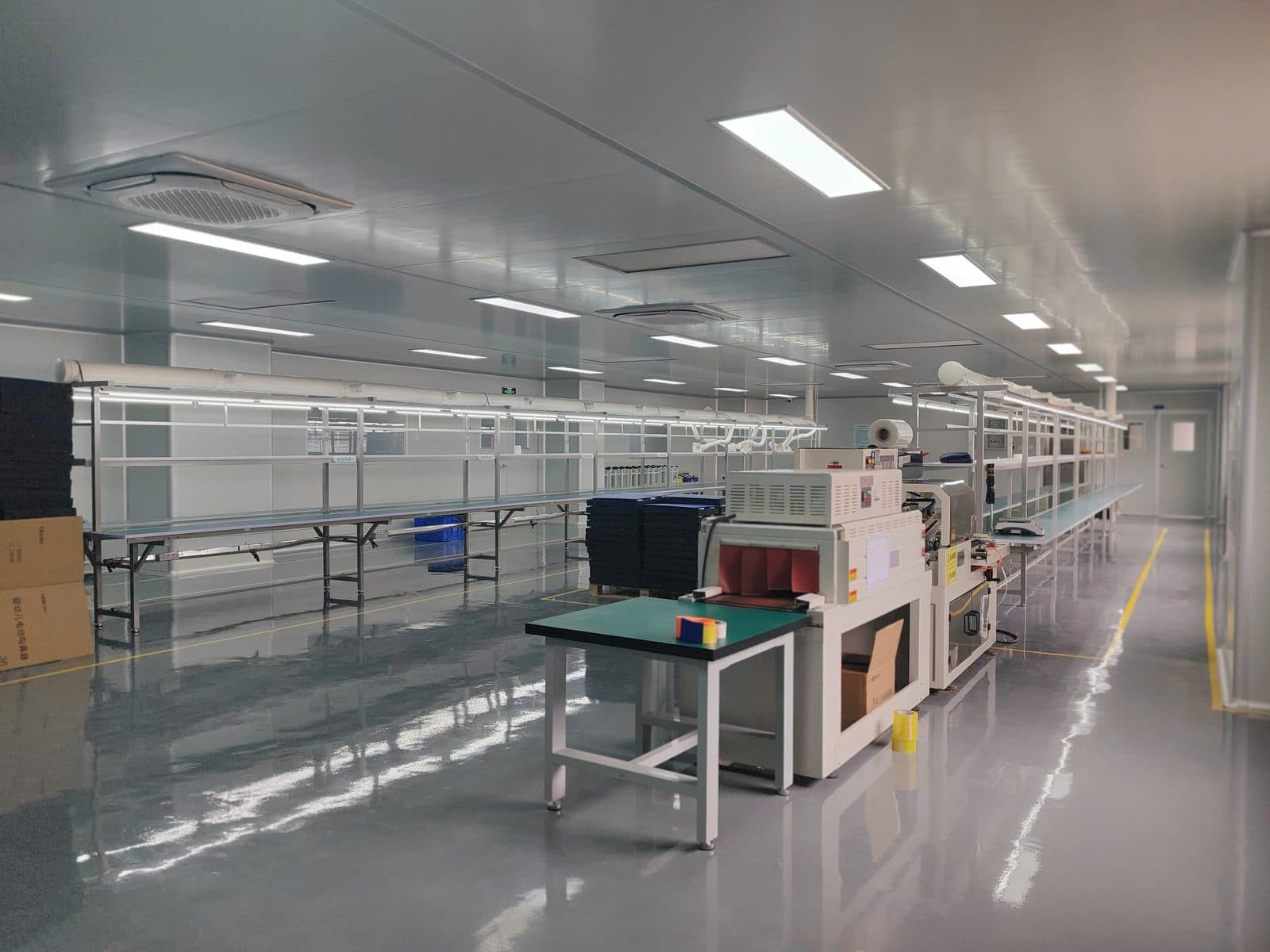 Assembly line with test and packing equipment at SiLeap's aspirator workshop
