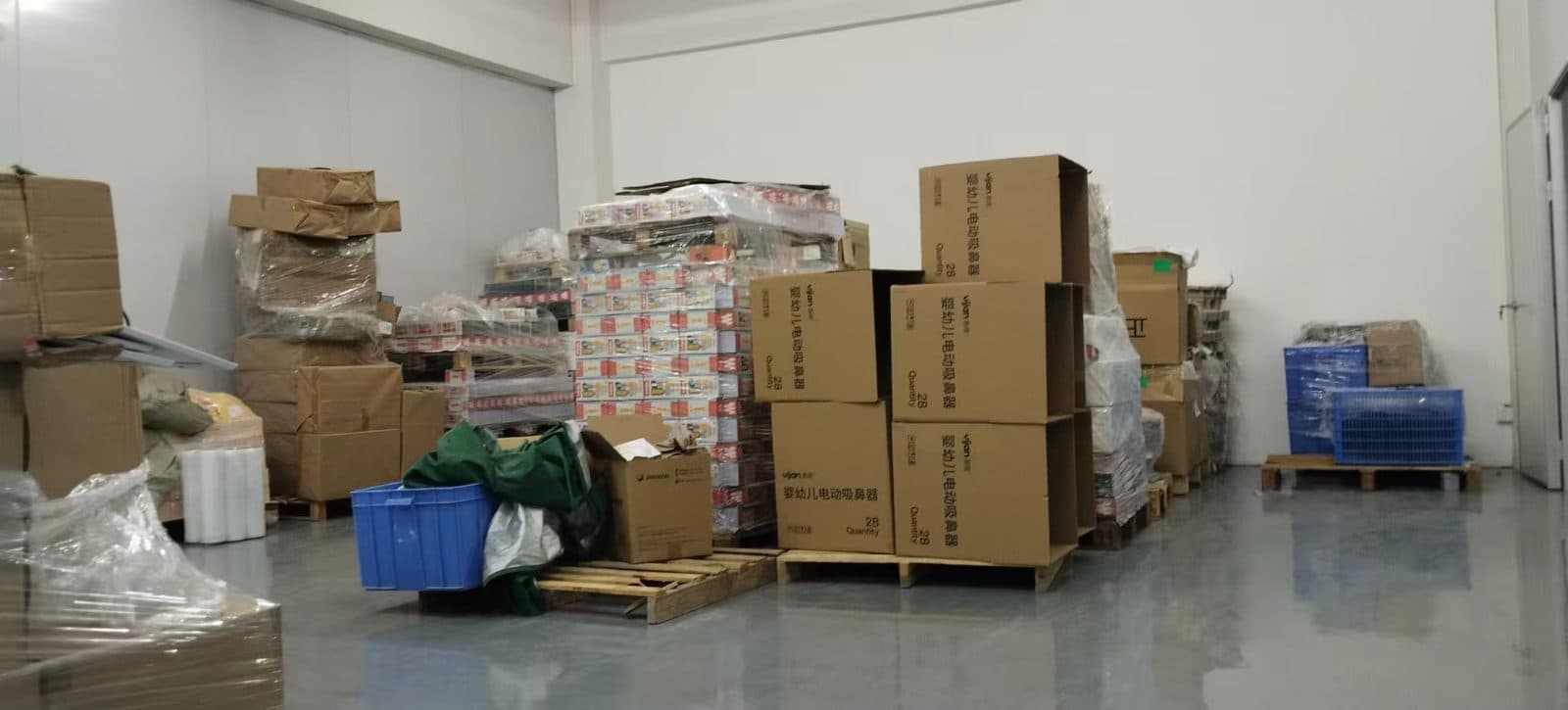 Warehouse and packing area for finished baby nasal aspirators awaiting export at SiLeap